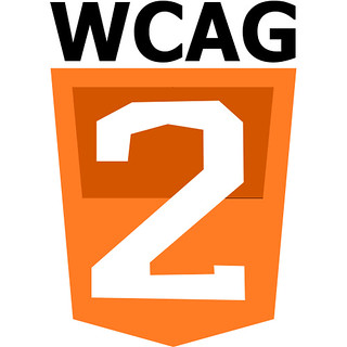 The WCAG logo. The letters WCAG on top of an orange shield with the number 2 dominating the shield.