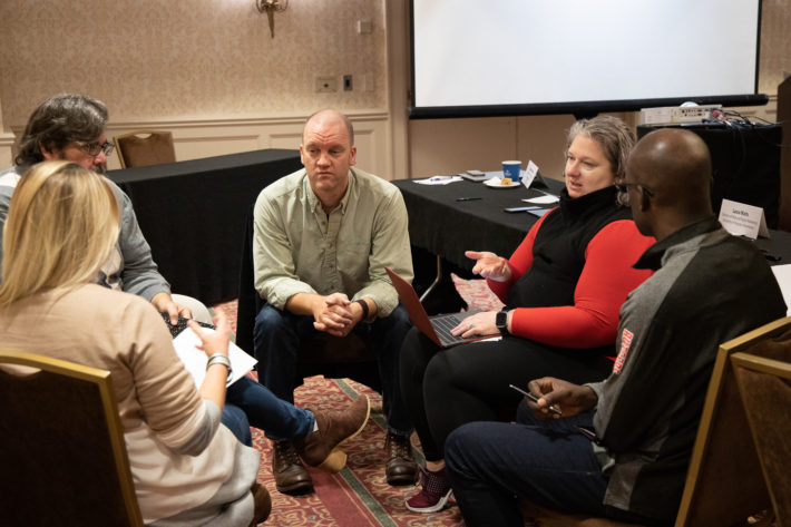 Members discussing a topic in a group