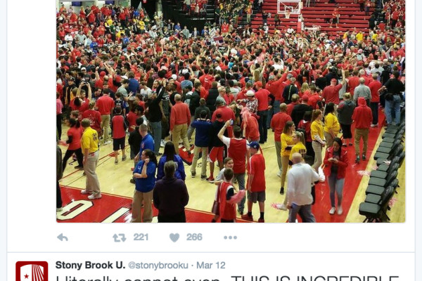 Stony Brook students rush the floor after clinching an NCAA tournament birth.