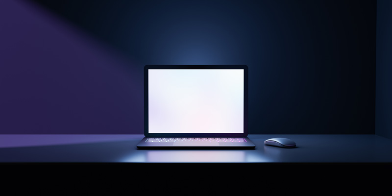 Photo of a white computer screen with a dark blue backdrop